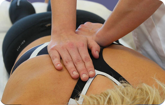 osteopath treating patient
